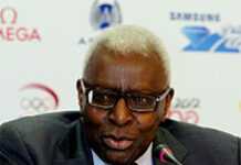 JO 2012 : Lamine Diack couronne Usain Bolt